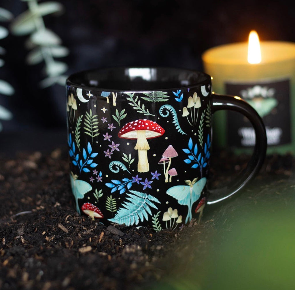 Dark Forest Mug - styled with candle on soil
