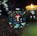 Dark Forest Mug - styled with candle on soil