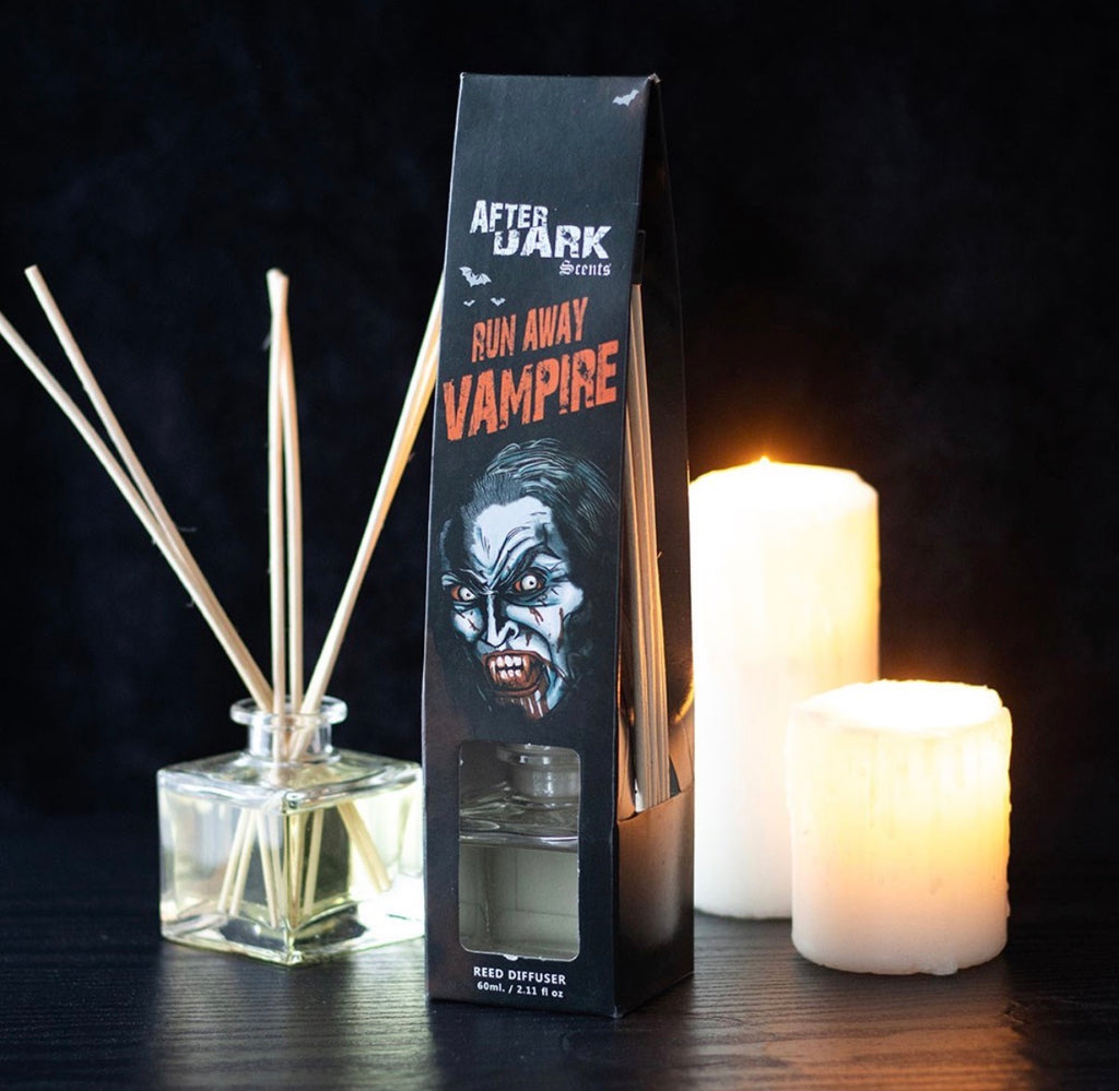Run Away Vampire Reed Diffuser - styled with candles