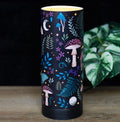 Dark Forest USB Aroma Lamp - lit on wooden surface with plant