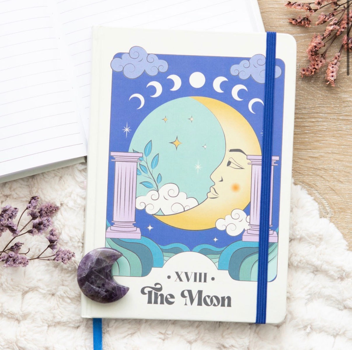 The Moon Celestial A5 Notebook styled with crystals and dried flowers