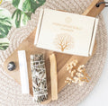 Yerba Santa Energy Cleansing Kit styled flat lay with sage, selenite and palo santo