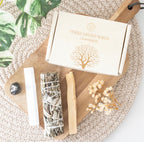 Yerba Santa Energy Cleansing Kit styled flat lay with sage, selenite and palo santo
