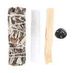 Yerba Santa Energy Cleansing Kit contents laid out — sage bundle, selenite, palo santo and black crystal