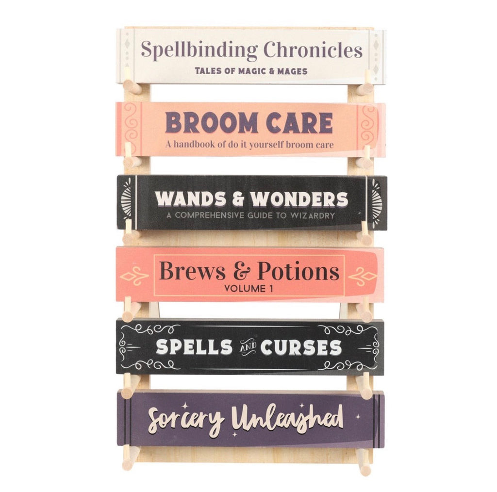 Witchy Book Spine Bookmarks Set of 6 displayed in wooden stand front view