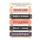 Witchy Book Spine Bookmarks Set of 6 displayed in wooden stand front view