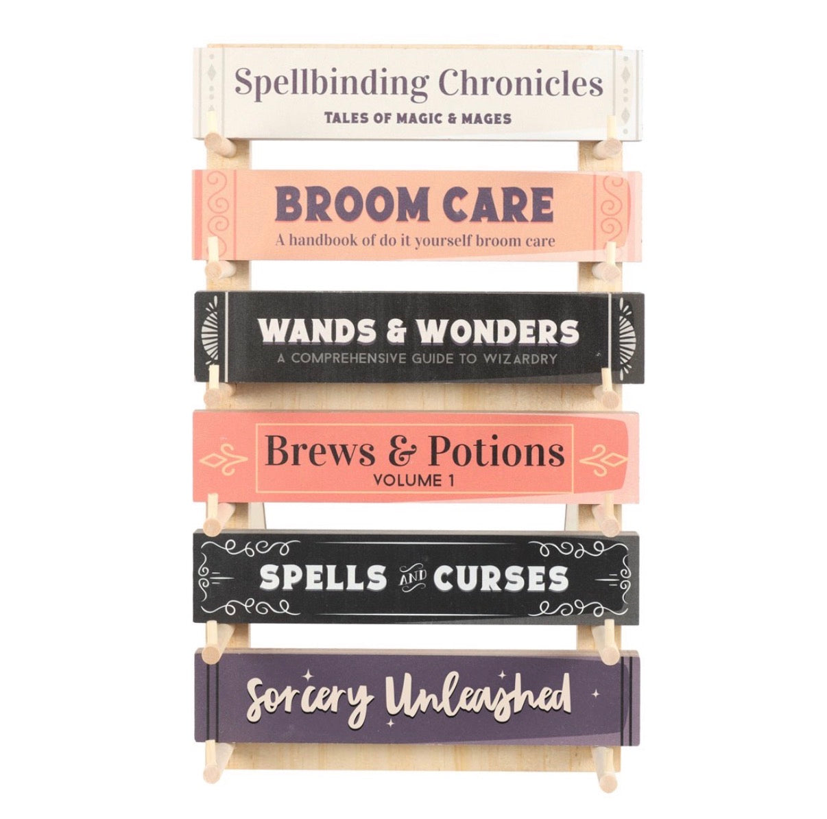 Witchy Book Spine Bookmarks Set of 6 displayed in wooden stand front view