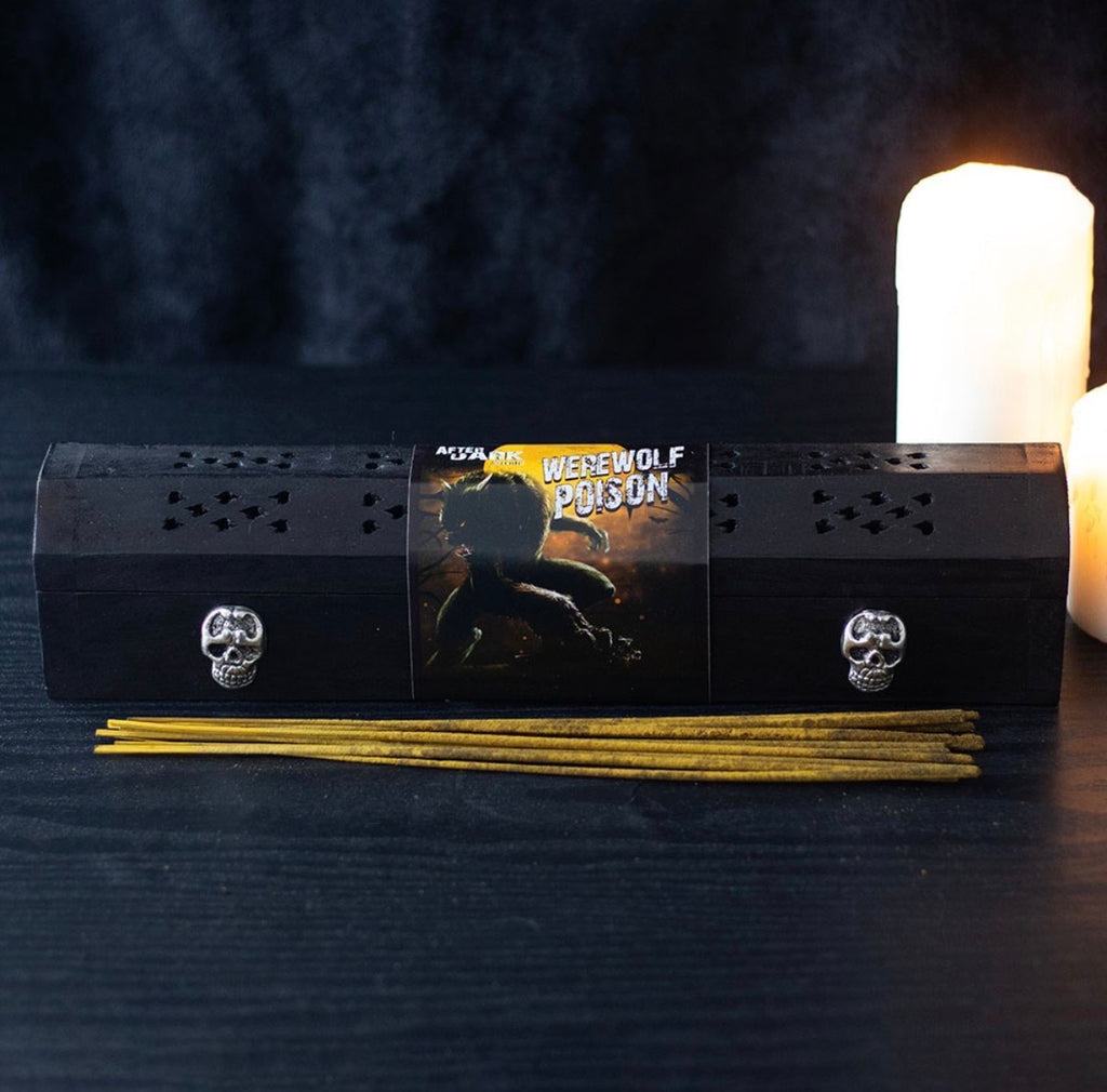Werewolf Poison skull incense box - lifestyle shot with candle