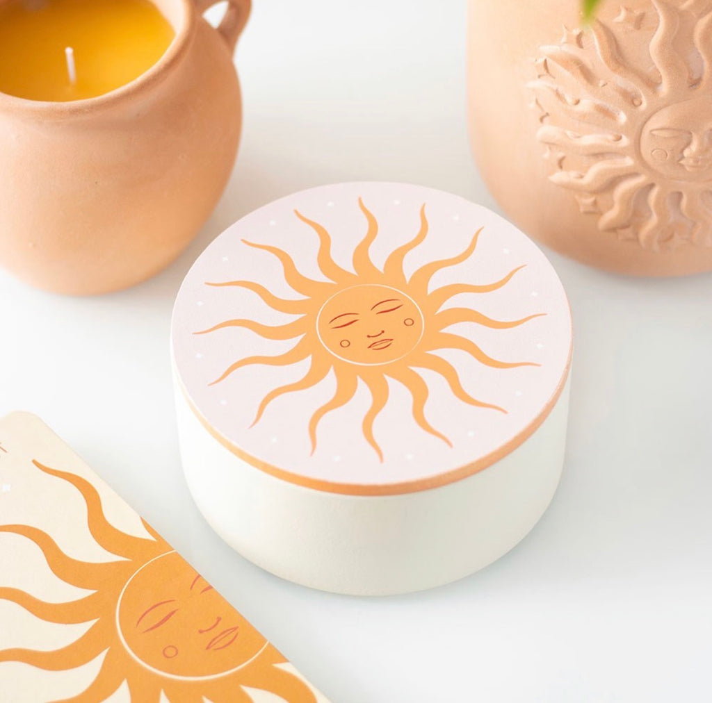 Golden Hour Sun Jewellery Box - lifestyle shot closed with candle