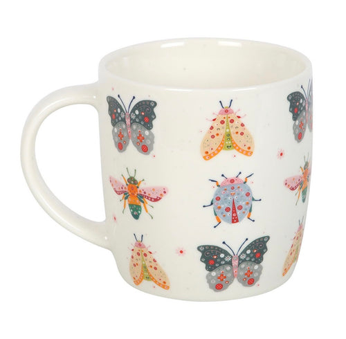 Butterfly and Bug Garden Ceramic Mug - front view on white background