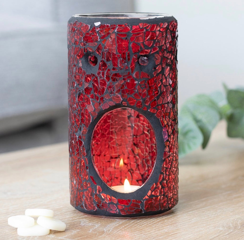 Red Pillar Crackle Glass Oil Burner - lifestyle shot lit on wooden surface