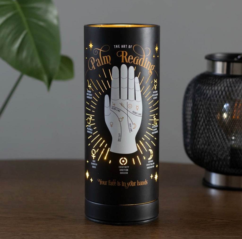 The Art of Palm Reading USB Lamp - lifestyle shot on wooden surface