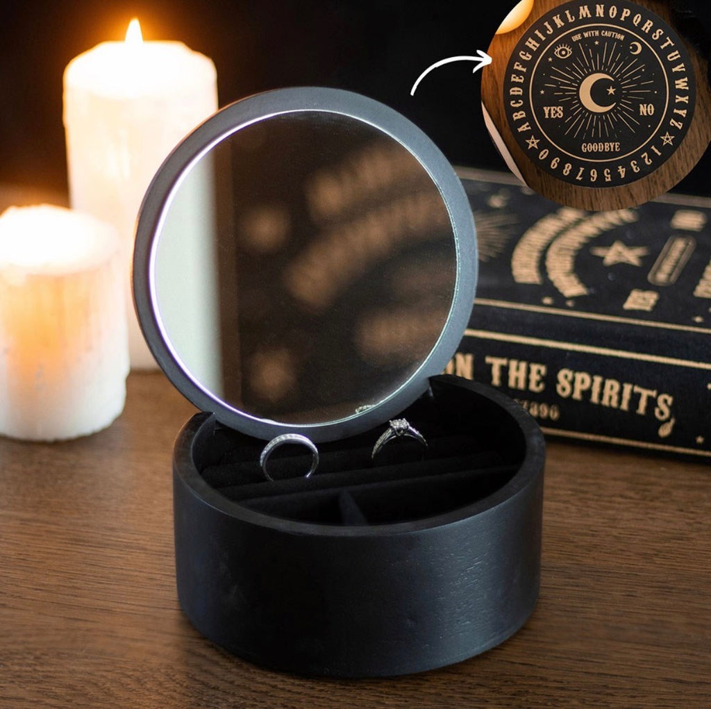 Ouija Board Round Jewellery Box with Mirror - open lifestyle shot with rings inside