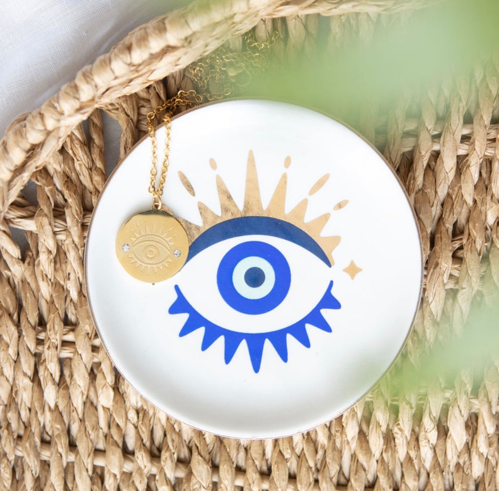 All Seeing Eye Necklace and Jewellery Dish Gift Set - lifestyle shot on rattan surface