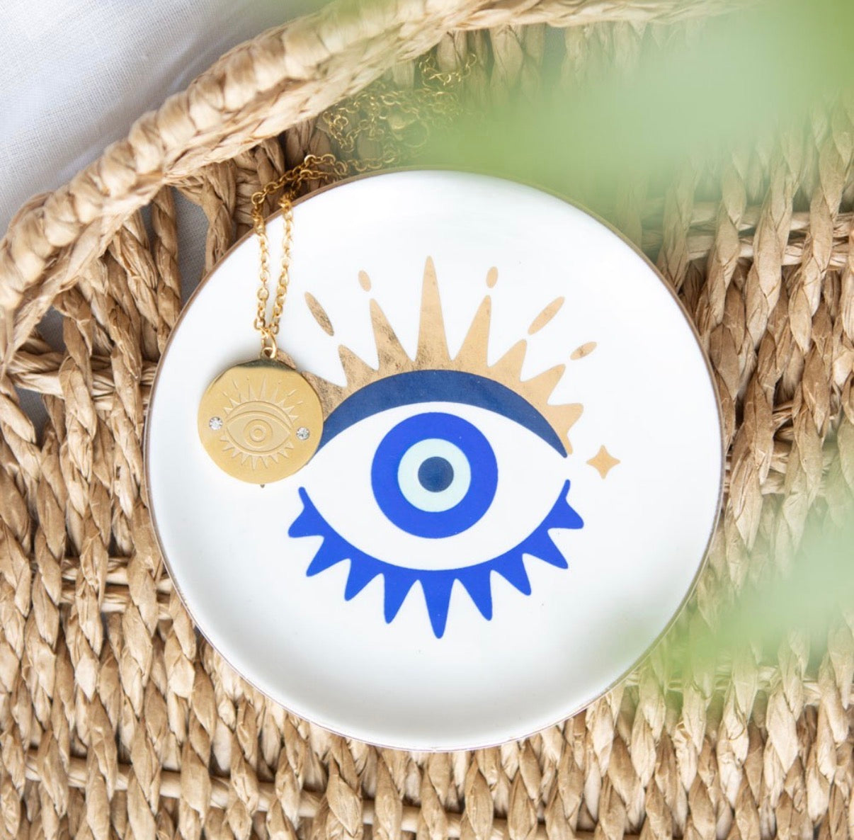 All Seeing Eye Necklace and Jewellery Dish Gift Set - lifestyle shot on rattan surface