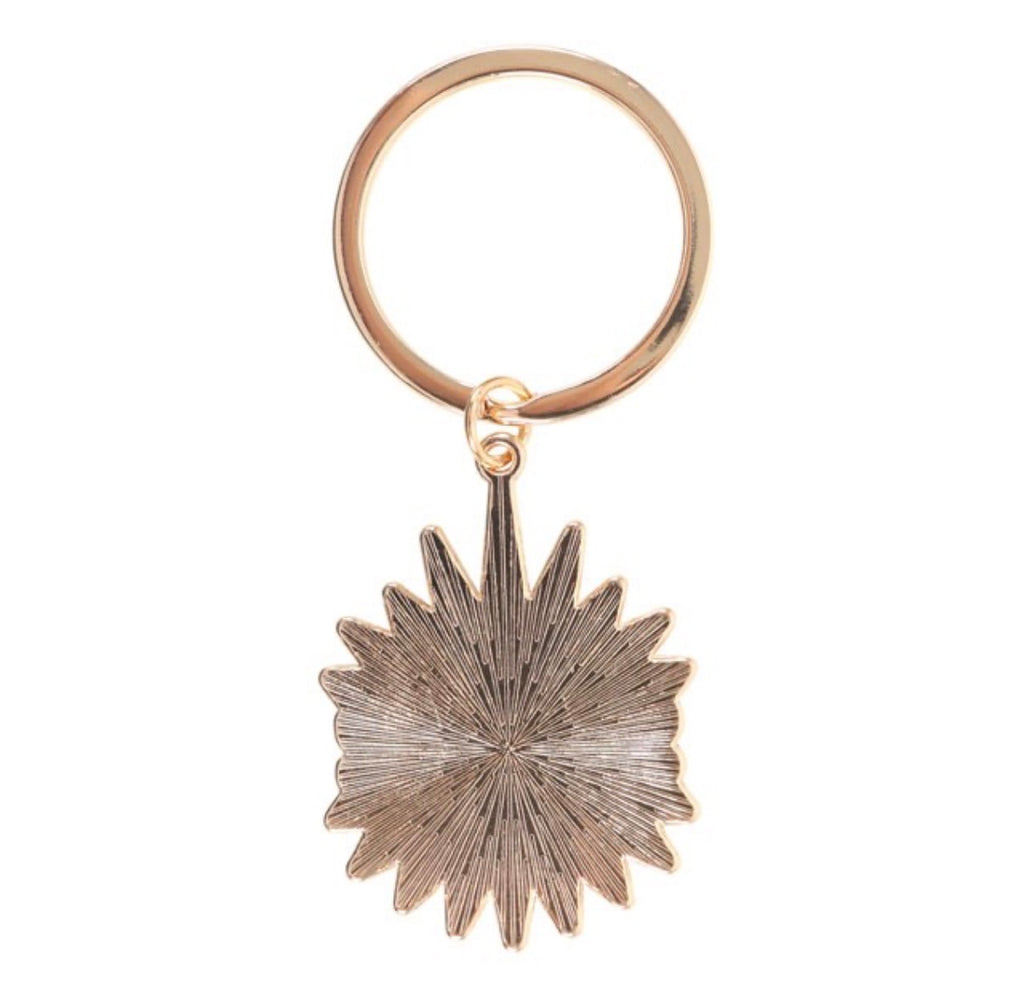 All Seeing Eye Enamel Keyring - gold starburst reverse charm on white background