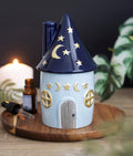 Celestial Cottage Ceramic Oil Burner lifestyle shot on wooden tray with candle and essential oil