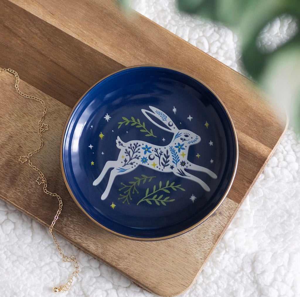 Leaping Hare Ceramic Trinket Dish lifestyle shot on wooden board with gold necklace