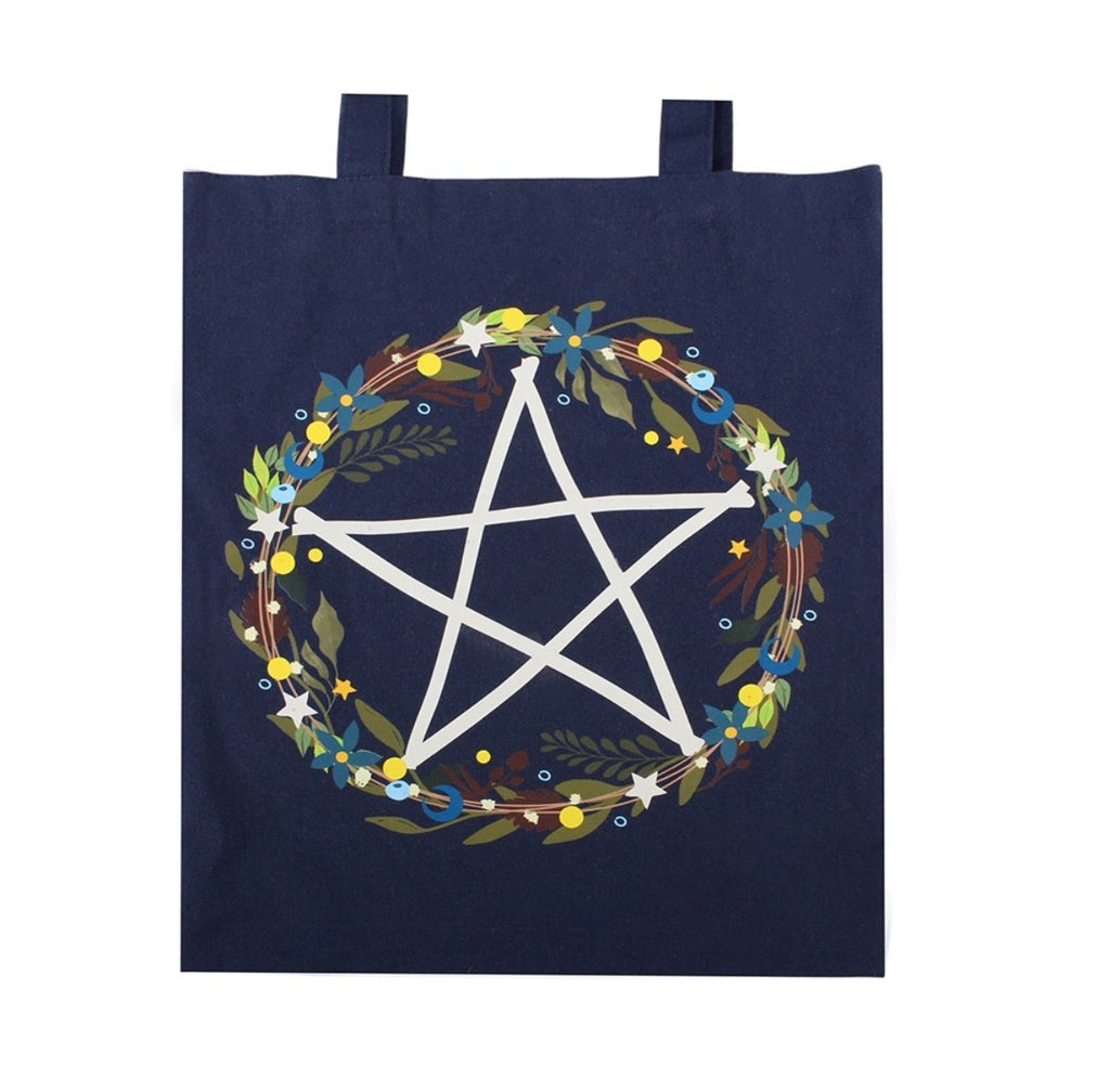Solstice Wreath Tote Bag close up of pentagram and floral wreath print detail