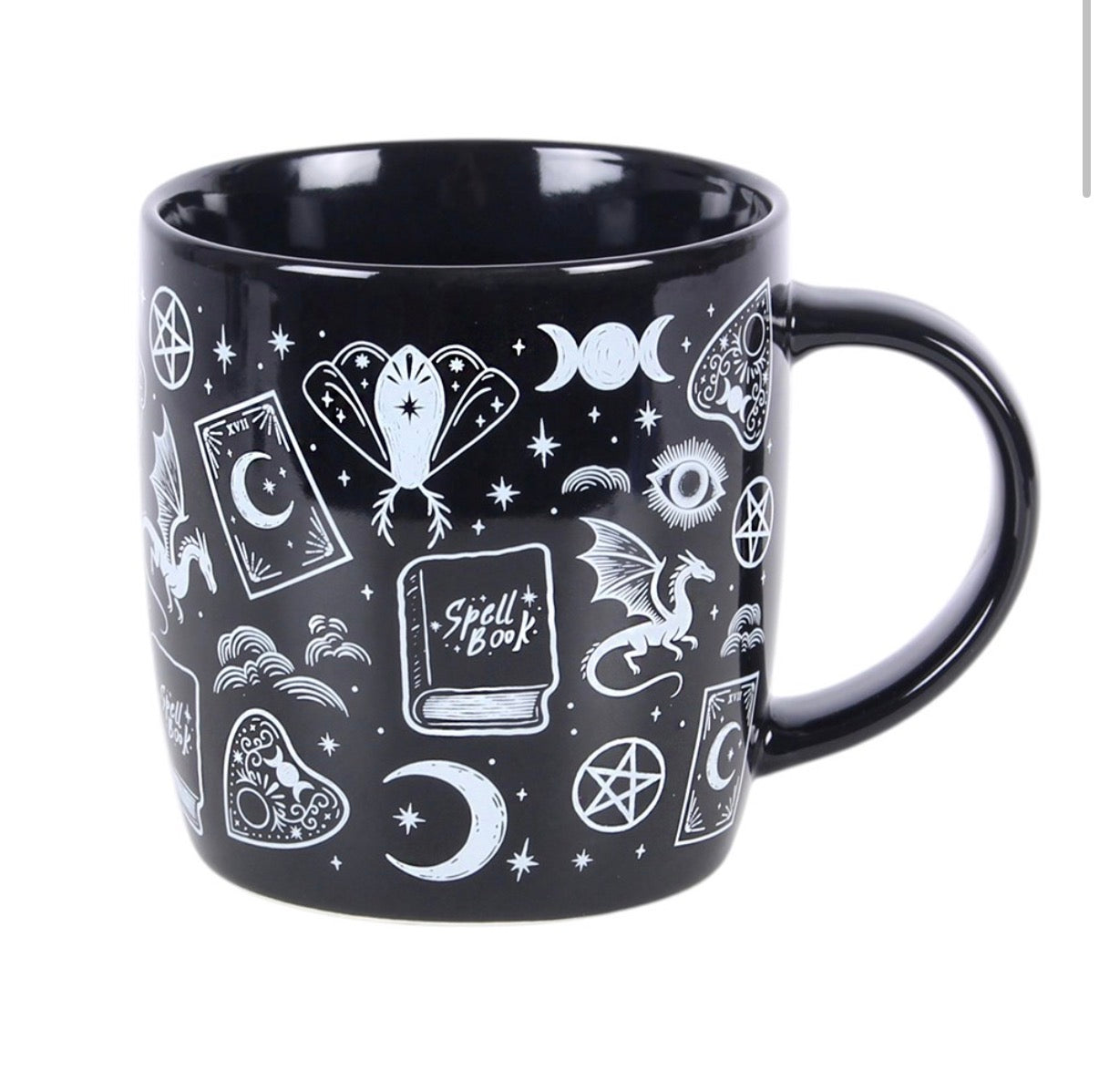 Spellbound Secrets Ceramic Mug front view white background showing spell book and moth