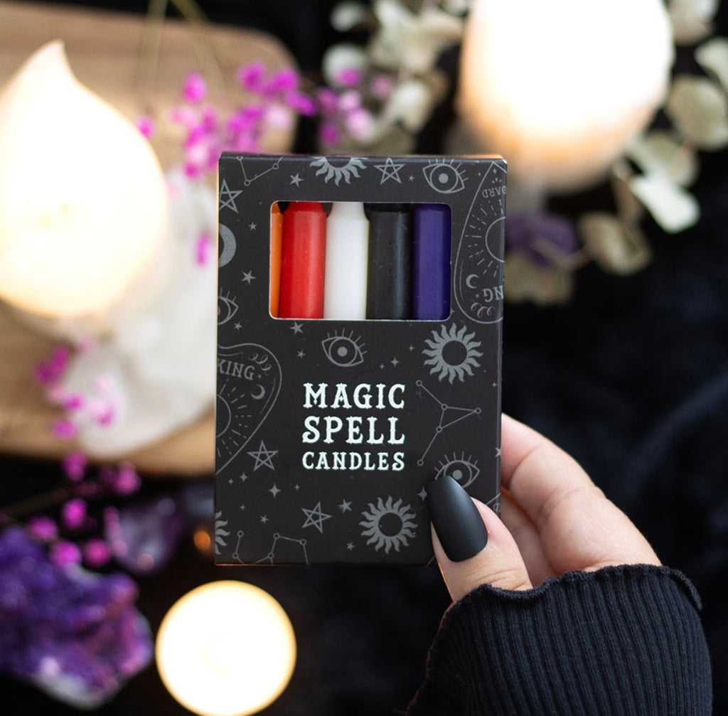 Magic Spell Candles by Spirit of Equinox - lifestyle shot held in hand with altar styling