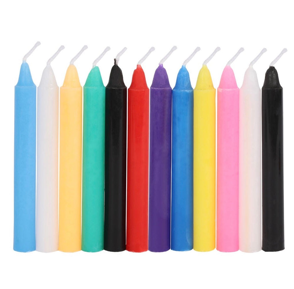 Magic Spell Candles by Spirit of Equinox - 12 assorted colour candles laid out white background