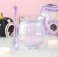 Double Walled Glass Cauldron Mug and Spoon - lifestyle styled shot with candles and ouija board