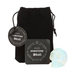 Opalite Gemstone Skull with black velvet pouch and info card white background