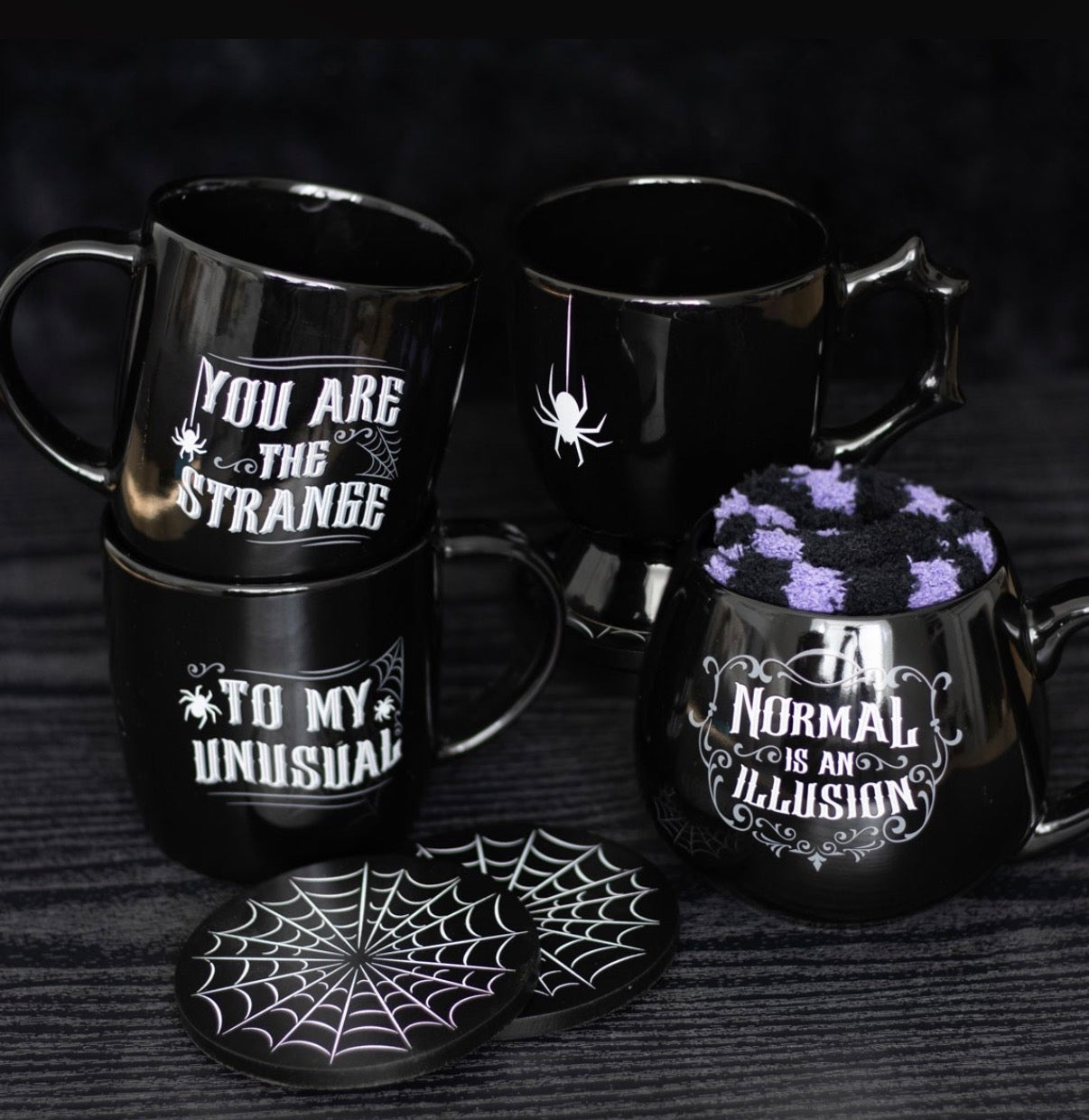 You Are The Strange To My Unusual Couples Mug Set - lifestyle shot with other gothic mugs and coasters