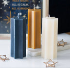 Starry Night star shaped candle gold - styled shot on book
