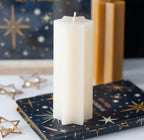 Starry Night star shaped candle cream - close up top white background