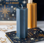 Starry Night star shaped candle navy - styled shot on book