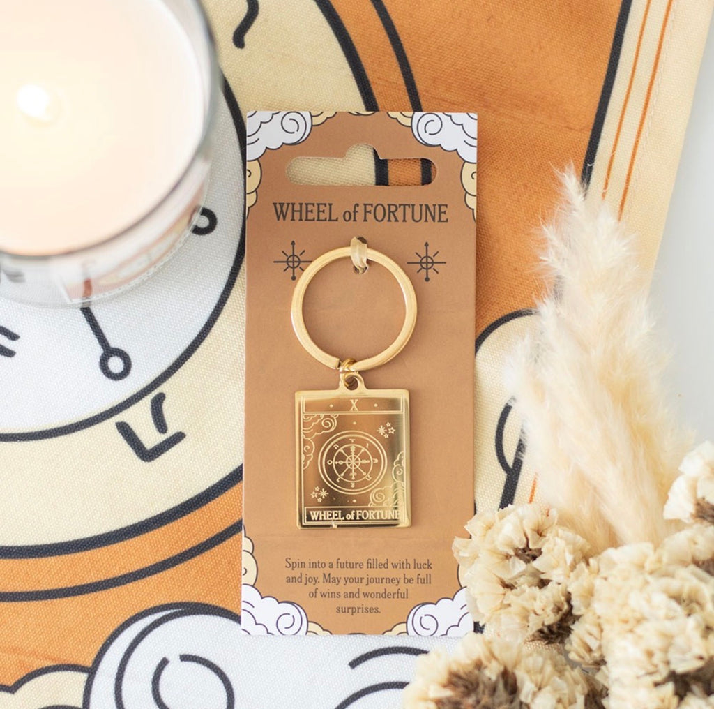 Wheel of Fortune tarot keyring on backing card - styled shot
