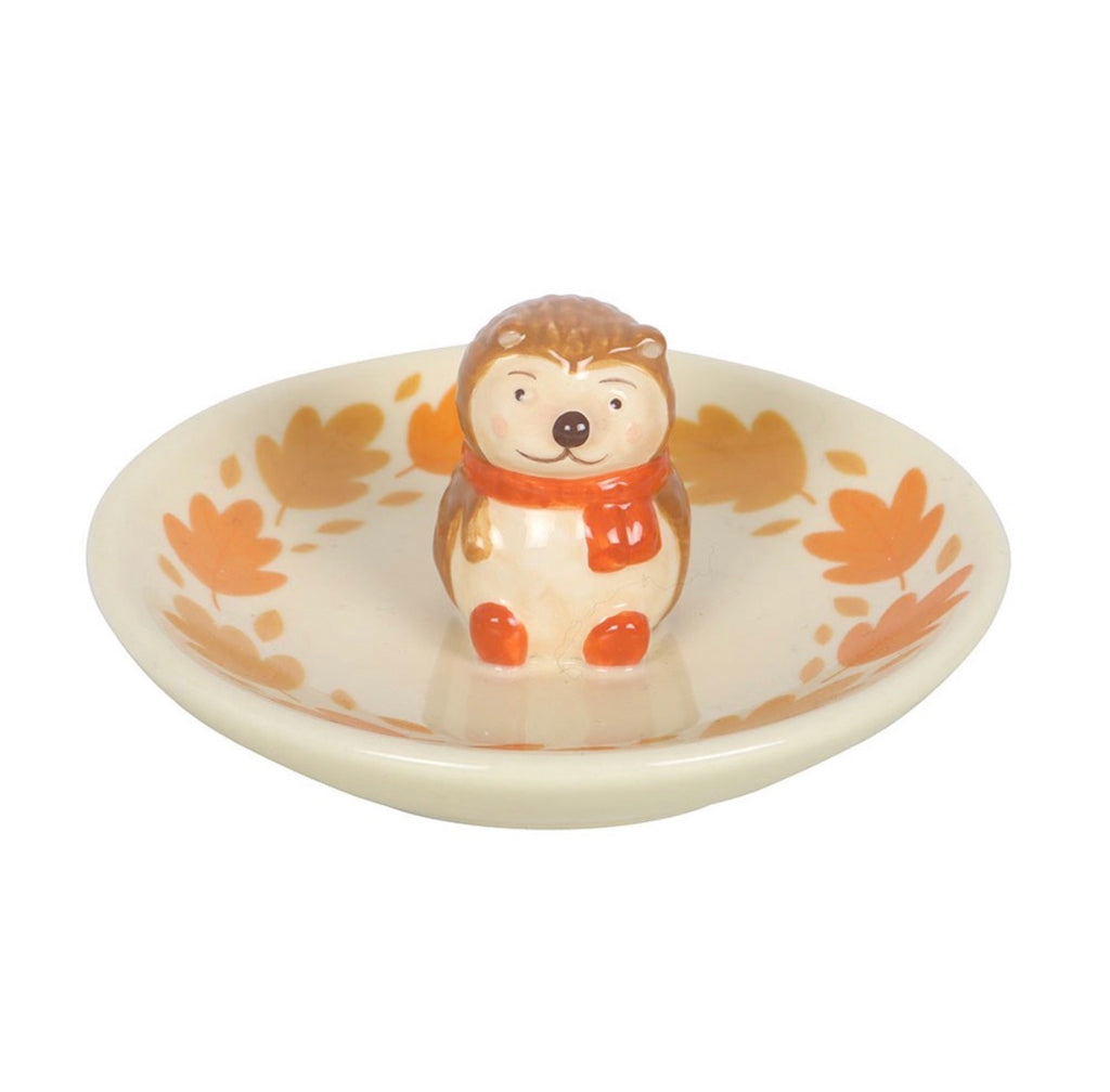 Hedgehog ceramic ring dish front view on white background showing hedgehog figurine with orange scarf