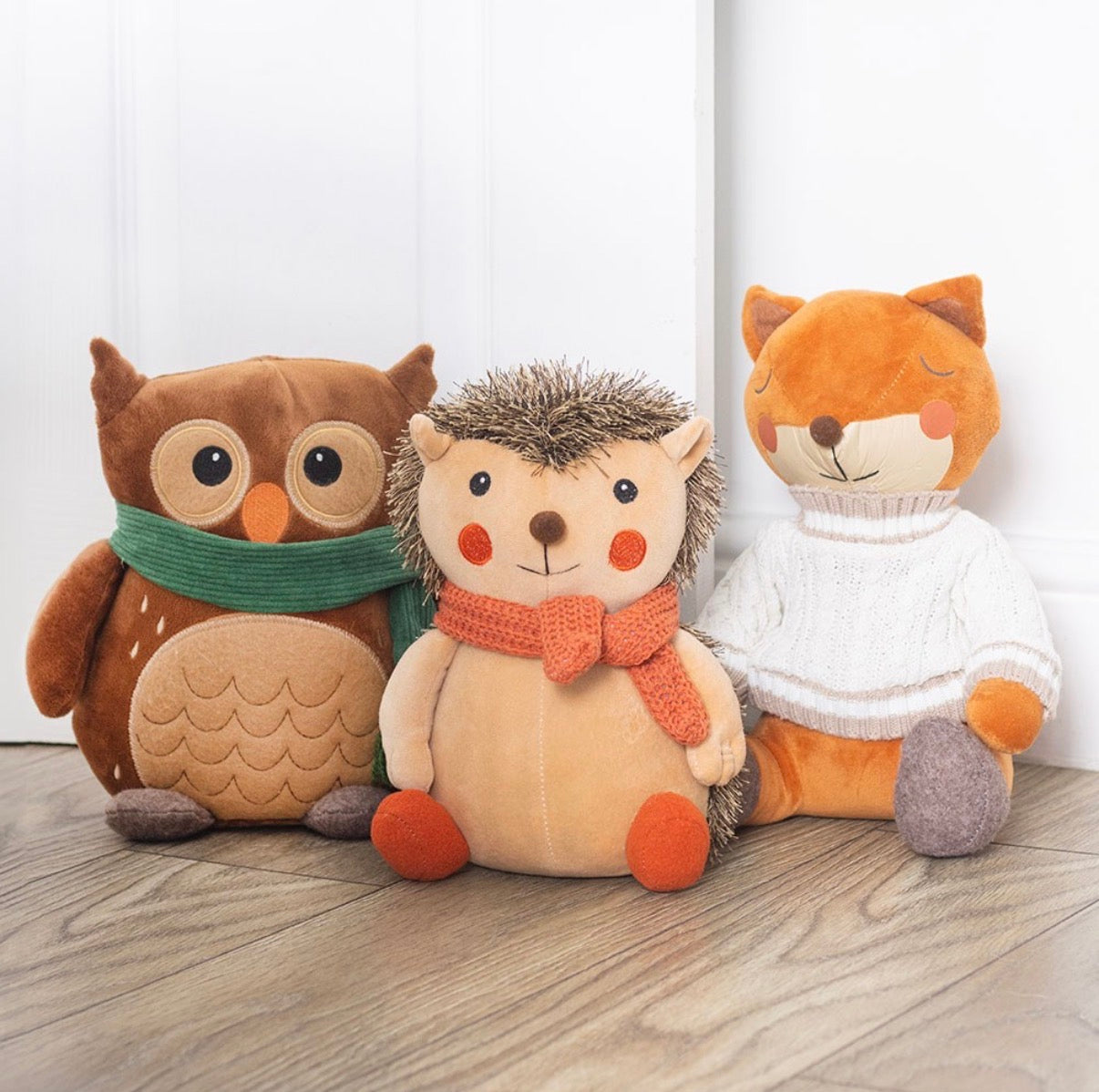 Woodland Friends plush doorstop trio showing Oliver The Owl Hazel The Hedgehog and Flynn The Fox together