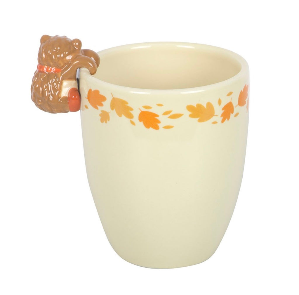 Hedgehog autumn leaves ceramic plant pot rear view showing autumn leaf print and hedgehog from behind
