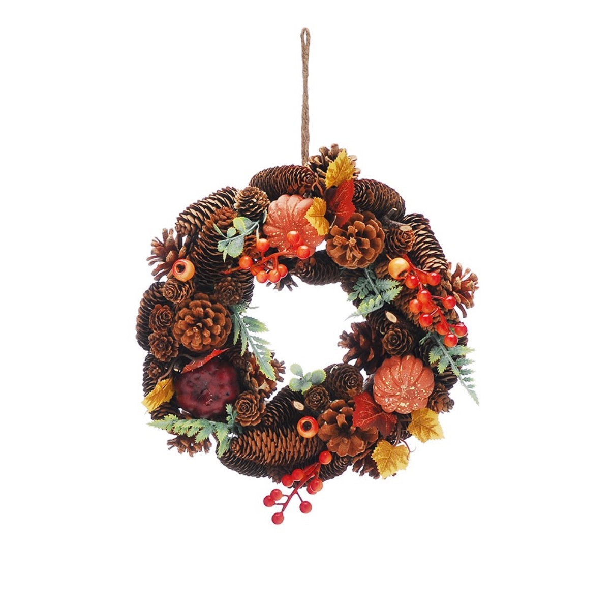 Autumn harvest wreath with pine cones, red berries, amber leaves and jute hanger against a white background