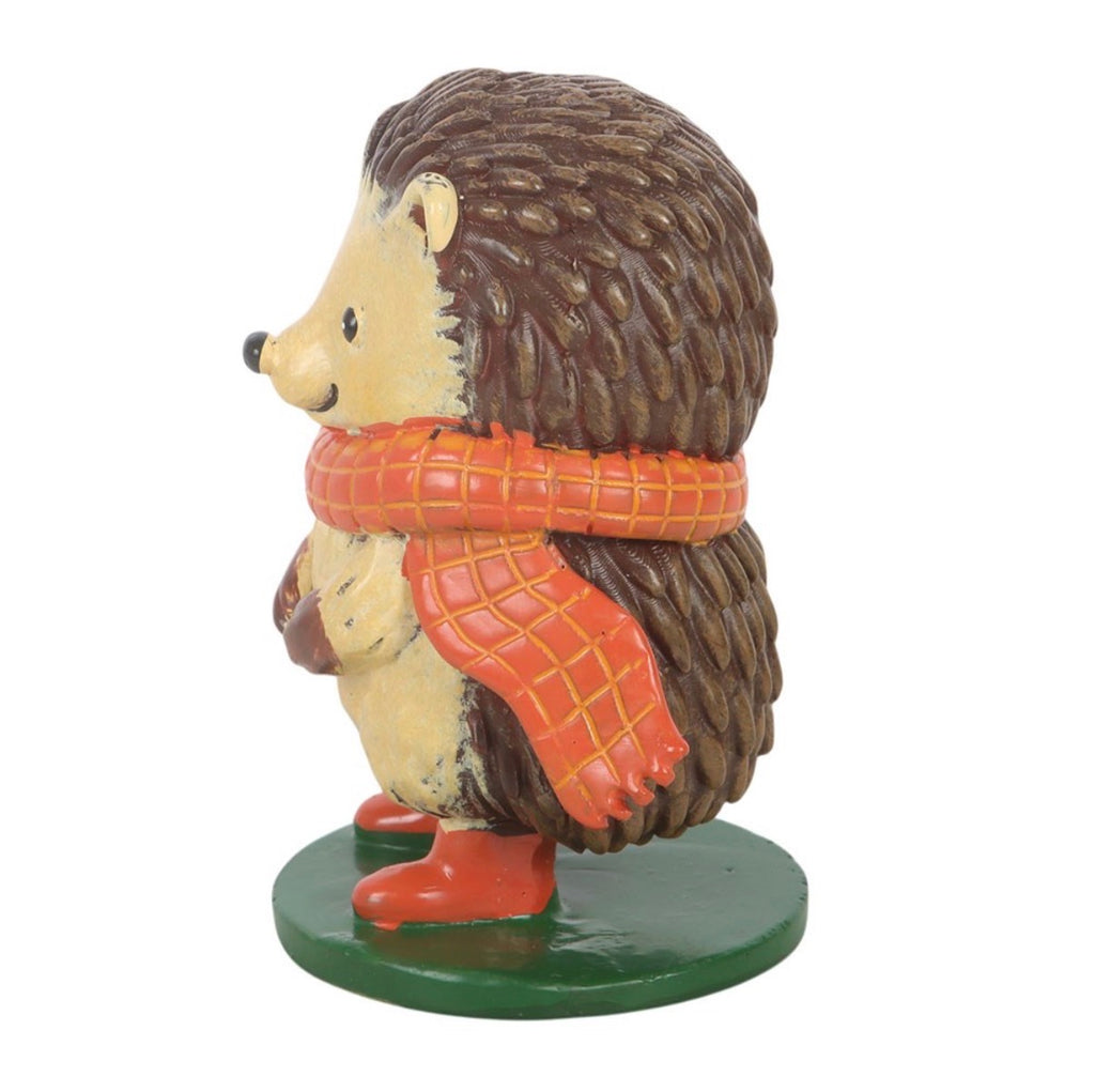 Hazel The Hedgehog resin ornament side view showing orange checked scarf and spines detail
