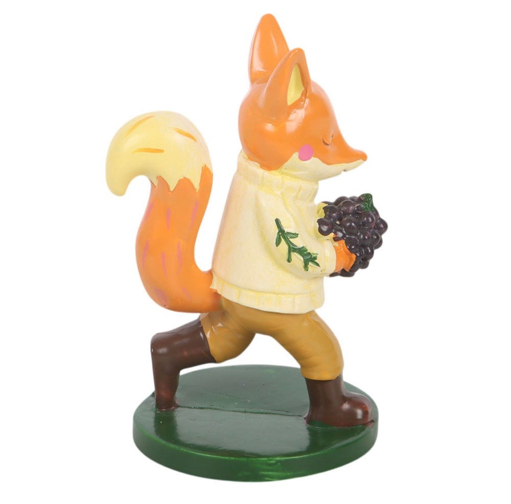 Flynn The Fox resin ornament side view showing fluffy tail and botanical jumper embroidery