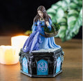 Anne Stokes Four Seasons Dragon Winter trinket box with candles in moody dark setting