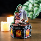 Anne Stokes Four Seasons Dragon Fall trinket box with candle in moody dark setting