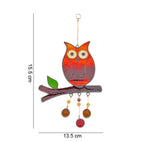 Stained glass orange owl suncatcher with dimensions shown, 13.5cm wide by 15.5cm tall, white background