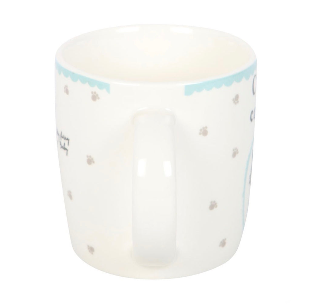 Back view of Crazy cat lady mug showing grey polka dot design and blue rim, white background