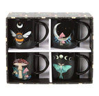 Dark Forest Set of Four mugs presented in open gift box showing all four black ceramic mugs, white background