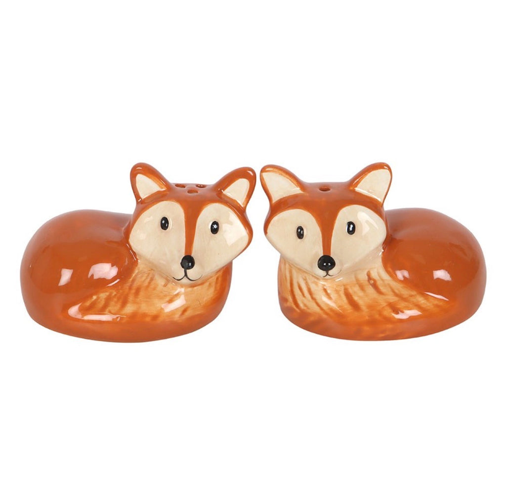 Two ceramic fox salt and pepper shakers front view on white background showing hand-painted russet and cream detail