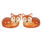 Two ceramic fox salt and pepper shakers front view on white background showing hand-painted russet and cream detail