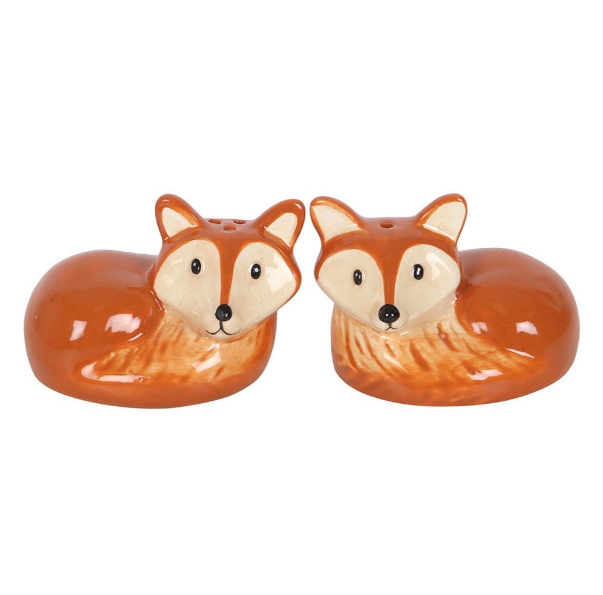 Two ceramic fox salt and pepper shakers front view on white background showing hand-painted russet and cream detail