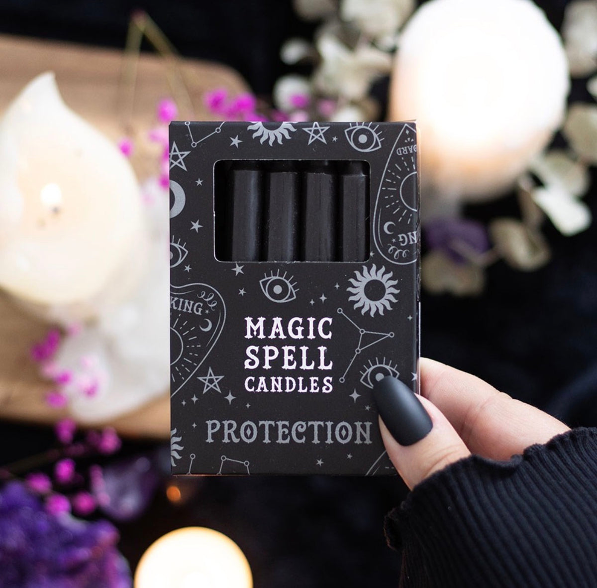 Single black mini spell candle