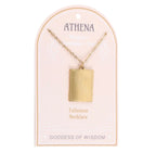 Hand holding the Athena Talisman Necklace on its Goddess of Wisdom presentation card