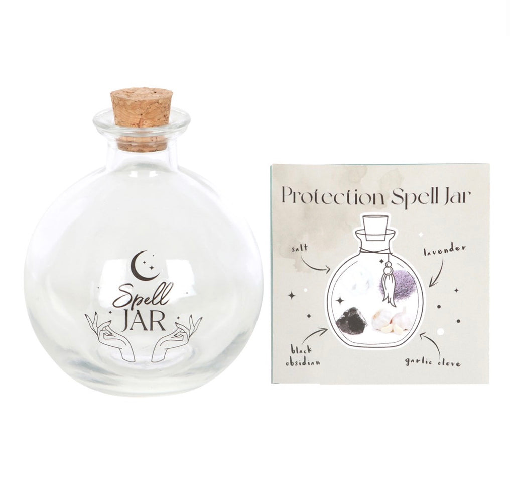 Back view of the clear glass spell jar with cork stopper
